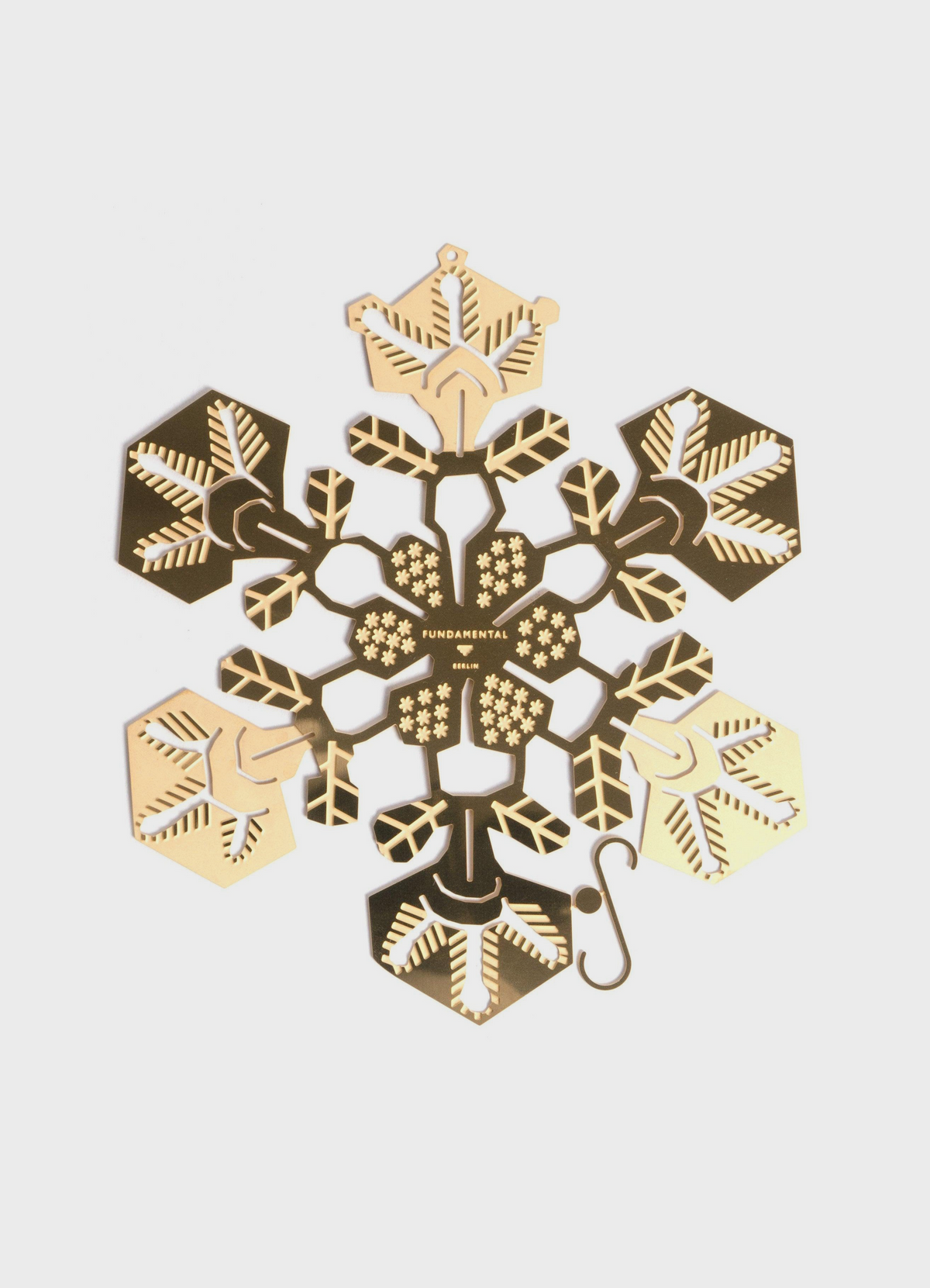 A single 15 cm brass Snowflake ornament, seen from the front